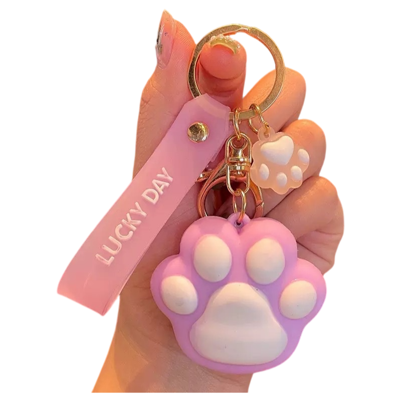 Paw Print Silicone Bag Charm Keychain – Cute Soft Touch Accessory with Lucky Day Tag