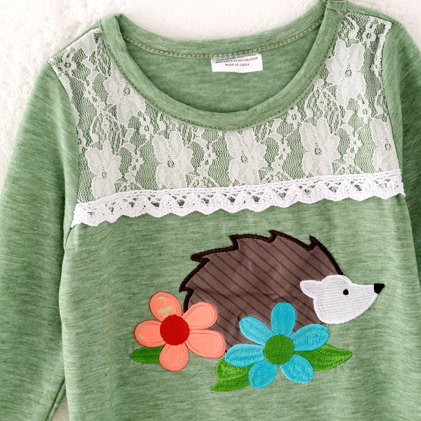 Baby Girl Ruffle Romper with Hedgehog Embroidery and Lace Detail