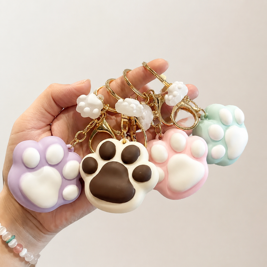 Paw Print Silicone Bag Charm Keychain – Cute Soft Touch Accessory with Lucky Day Tag