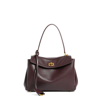 Slouchy Turn-Lock Shoulder Bag in Leather or Suede