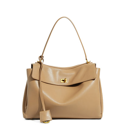 Slouchy Turn-Lock Shoulder Bag in Leather or Suede