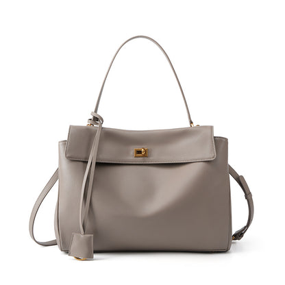 Slouchy Turn-Lock Shoulder Bag in Leather or Suede