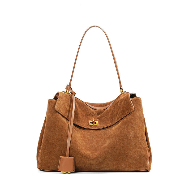 Slouchy Turn-Lock Shoulder Bag in Leather or Suede
