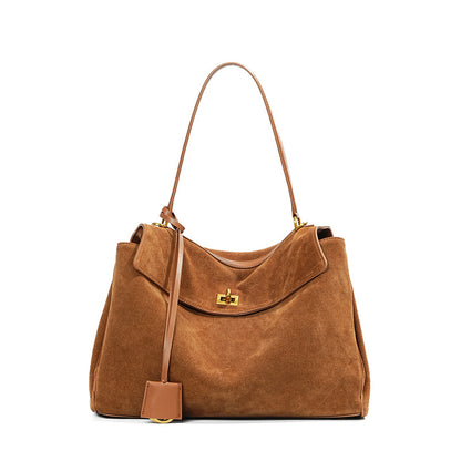 Slouchy Turn-Lock Shoulder Bag in Leather or Suede
