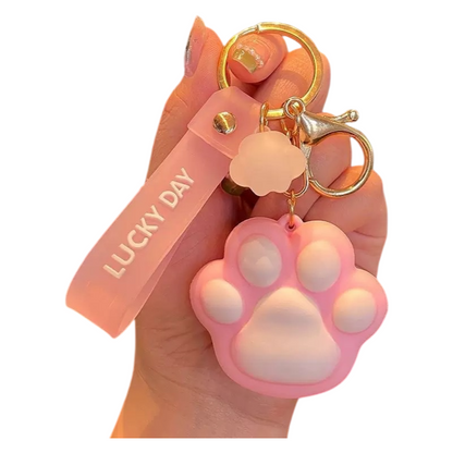 Paw Print Silicone Bag Charm Keychain – Cute Soft Touch Accessory with Lucky Day Tag