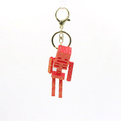 Pixel Skeleton 3D Keychain – Metallic Halloween Bag Charm