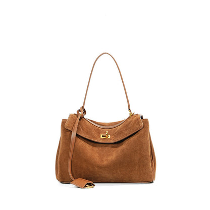 Slouchy Turn-Lock Shoulder Bag in Leather or Suede