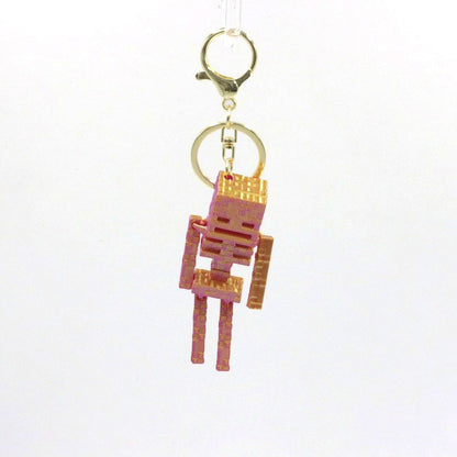 Pixel Skeleton 3D Keychain – Metallic Halloween Bag Charm