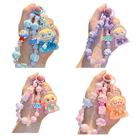 Labubu Sitting Keychain Cute Vinyl Figure Charm with Beaded Chain for Keys or Bag