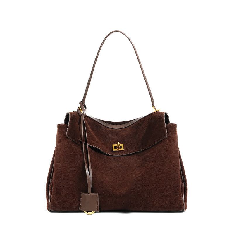 Slouchy Turn-Lock Shoulder Bag in Leather or Suede