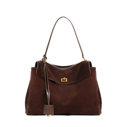 Slouchy Turn-Lock Shoulder Bag in Leather or Suede
