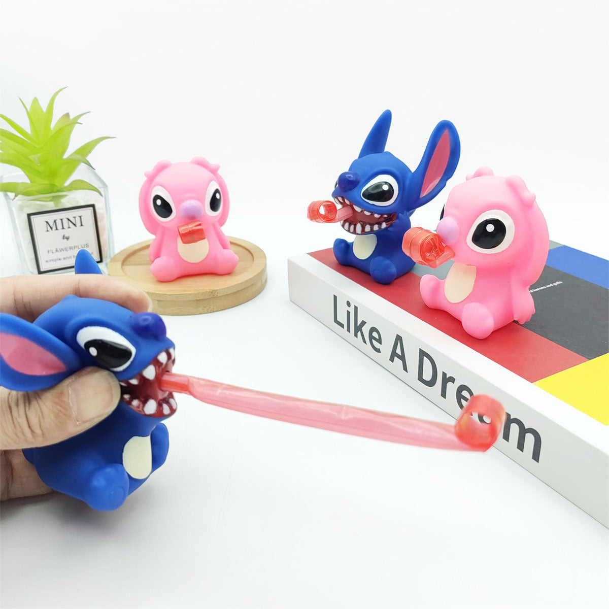 Cute Cartoon Monster Tongue Extension Squishy Stress Relief Toy Keychain