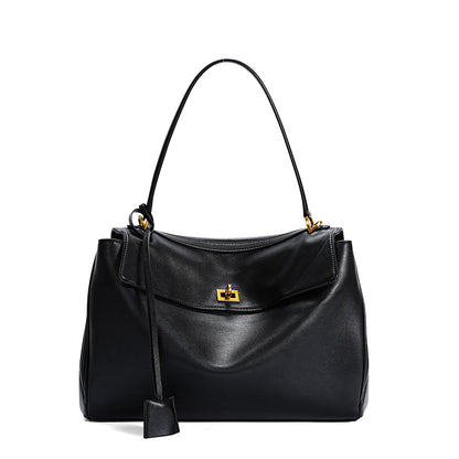 Slouchy Turn-Lock Shoulder Bag in Leather or Suede