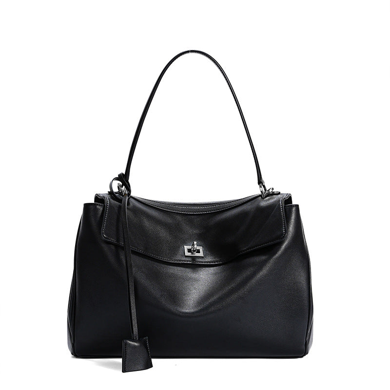 Slouchy Turn-Lock Shoulder Bag in Leather or Suede