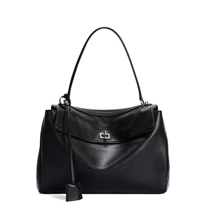 Slouchy Turn-Lock Shoulder Bag in Leather or Suede