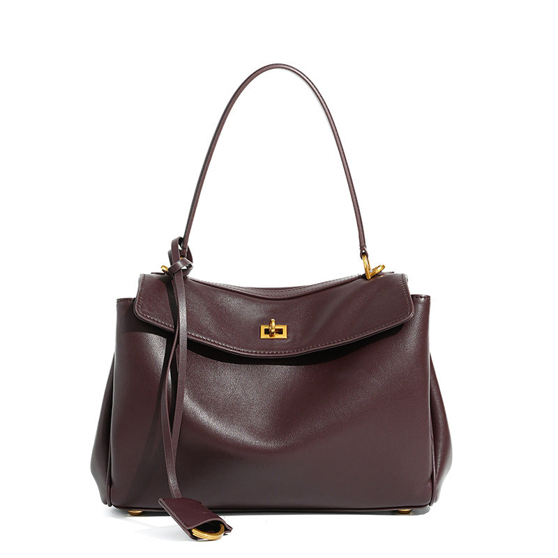 Slouchy Turn-Lock Shoulder Bag in Leather or Suede