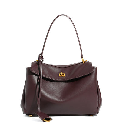Slouchy Turn-Lock Shoulder Bag in Leather or Suede